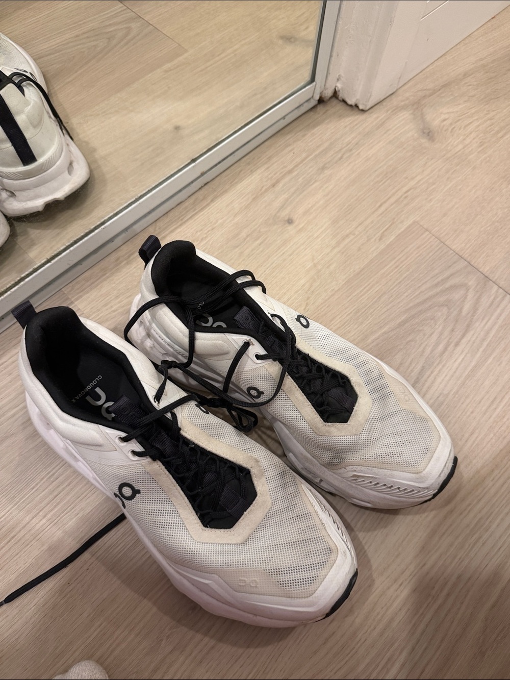 On Running women’s White and Black Cloudnova Athletic Shoes